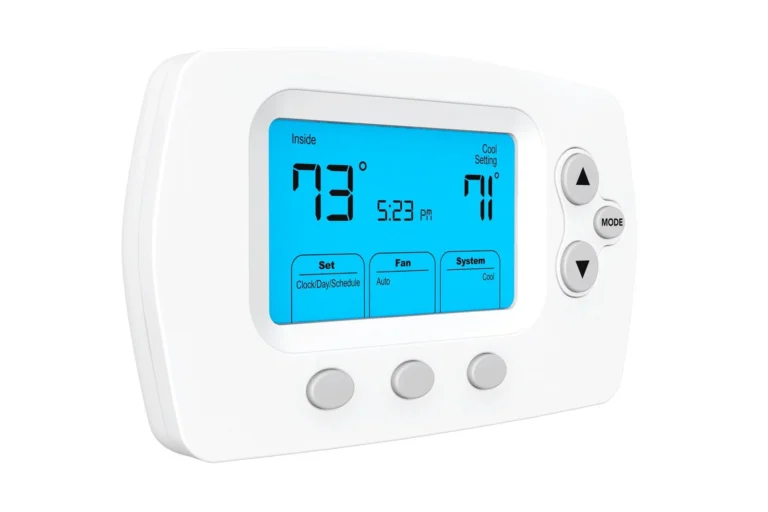 %Imagetitle% | New Berlin Heating &Amp; Air Conditioning A digital thermostat displaying an indoor temperature of 79°F and a cooling setting of 71°F, showing the time as 5:23 PM. It has buttons for mode, fan, and system settings.